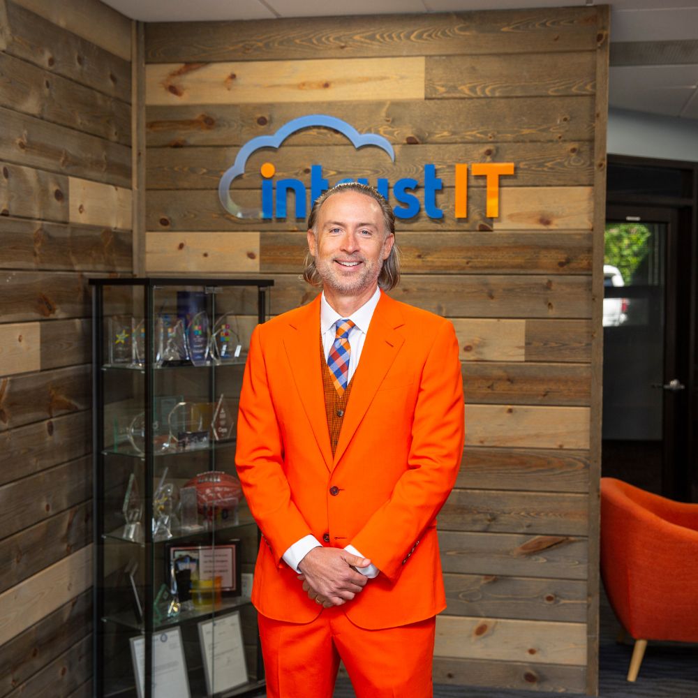 managed services Tim Rettig Orange Suit
